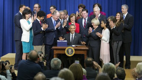 NEA President Lily Eskelsen Garcia attends the signing of the Every Student Succeeds Act by U.S. President Barack Obama.